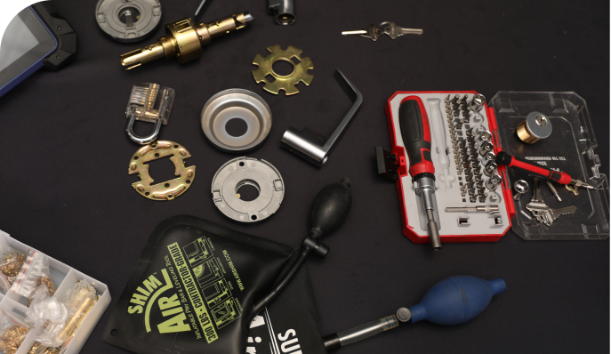 locksmith tools on a black background